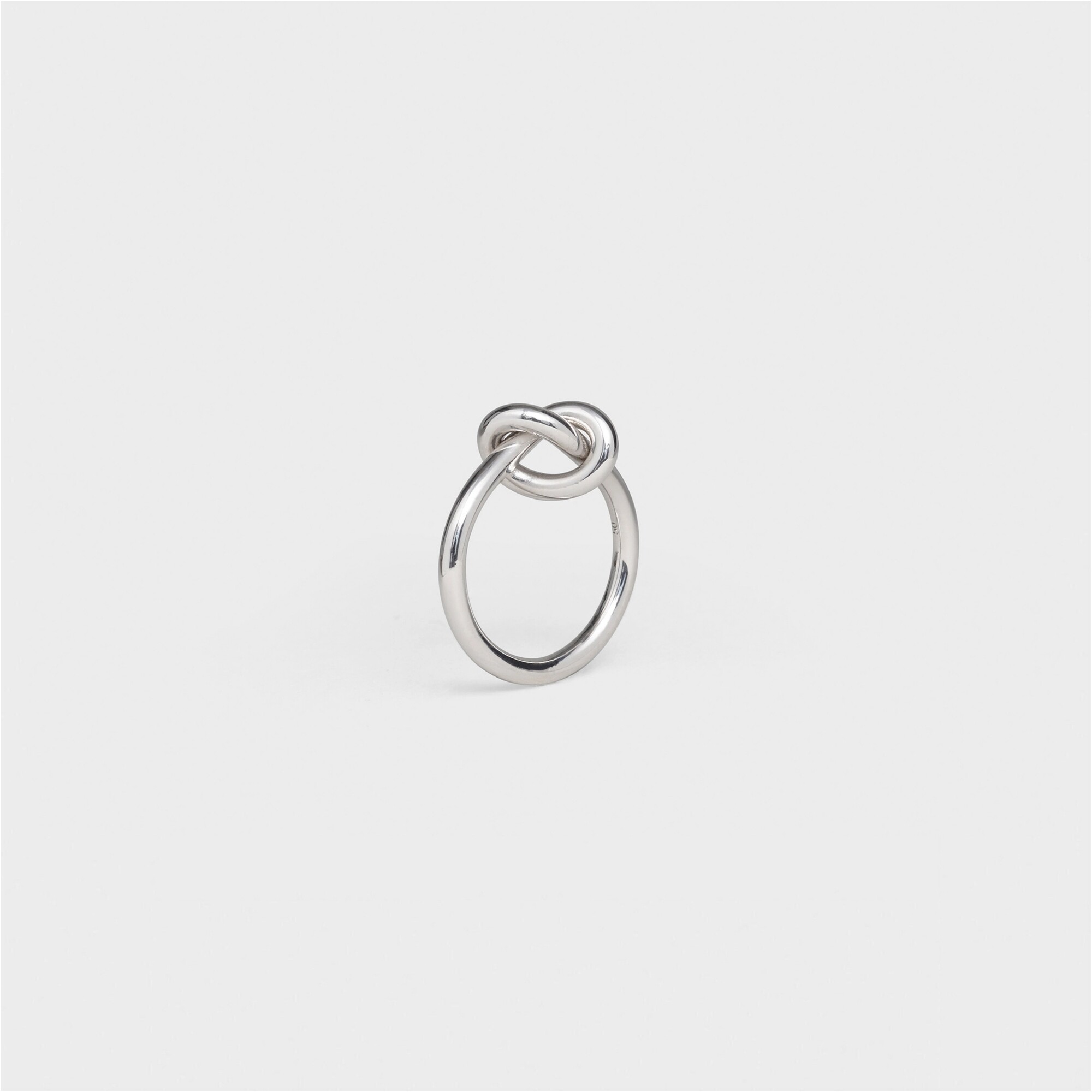 Celine Knot Ring In Brass With Rhodium Finish Silver