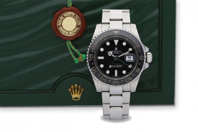 ROLEX | GMT-MASTER II, A STAINLESS STEEL DUAL TIME BRACELET WATCH WITH DATE, 2008 (COMPLETE SET)成交價：75,625港元 關於早前「威士忌