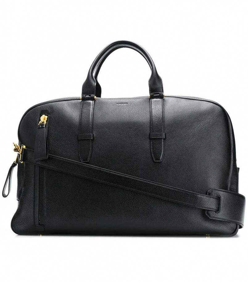 全真皮加上金扣的設計夠classic吧，Tom Ford這個旅行袋盡現其對經典紳士造型